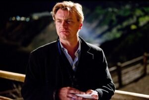 Christopher Nolan directing a film set