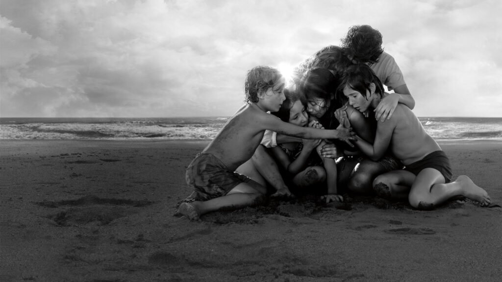 A powerful scene from Alfonso Cuarón’s Roma (2018) showing Cleo with the children at the beach