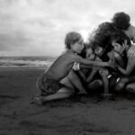 Roma (2018) Review, Breakdown & Ending Explained 5 A powerful scene from Alfonso Cuarón’s Roma (2018) showing Cleo with the children at the beach